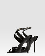 Sandals in black patent leather