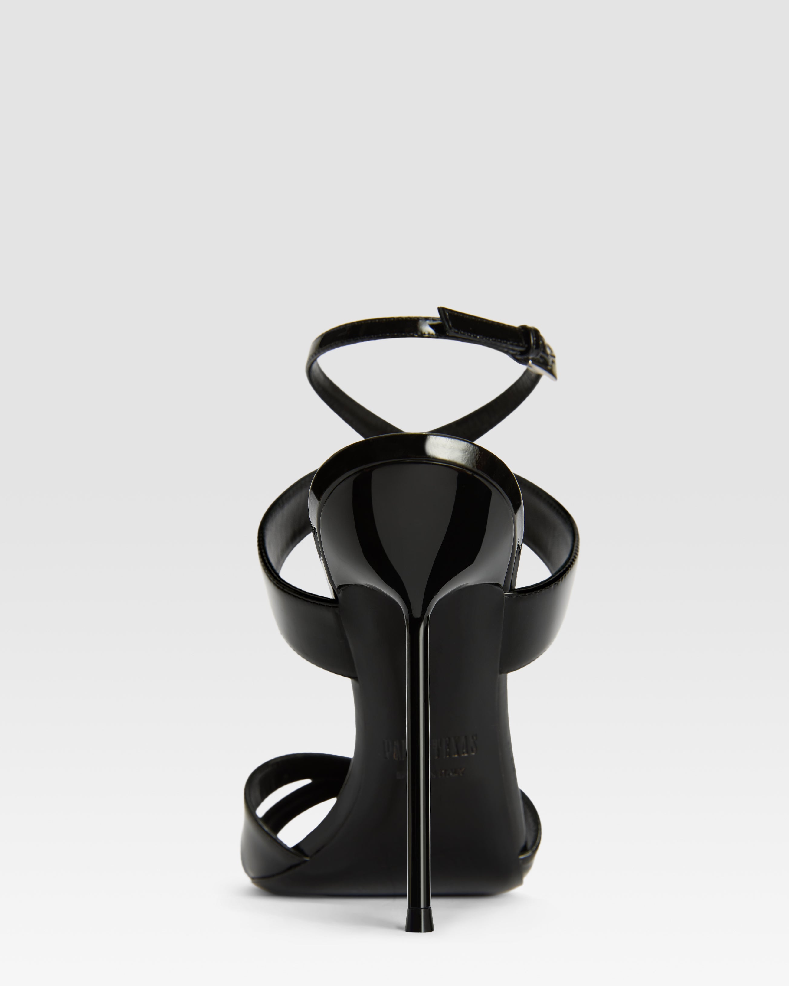 Sandals in black patent leather