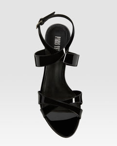 Sandals in black patent leather