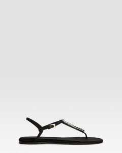 Flat sandals in black crepe satin with stud detailing