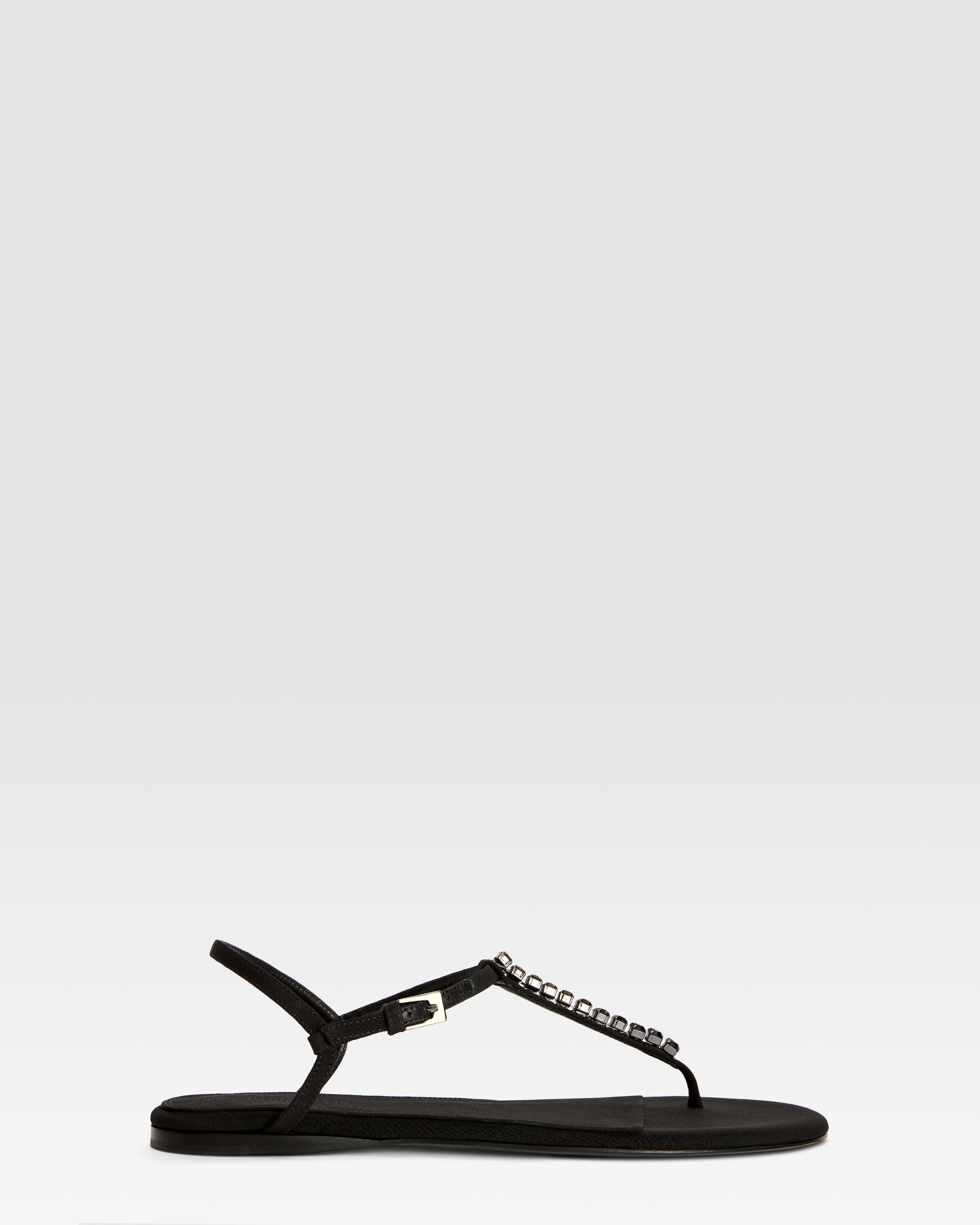 Flat sandals in black crepe satin with stud detailing