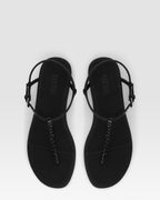Flat sandals in black crepe satin with stud detailing