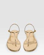 Flat sandals in gold metallic-effect, plisse leather