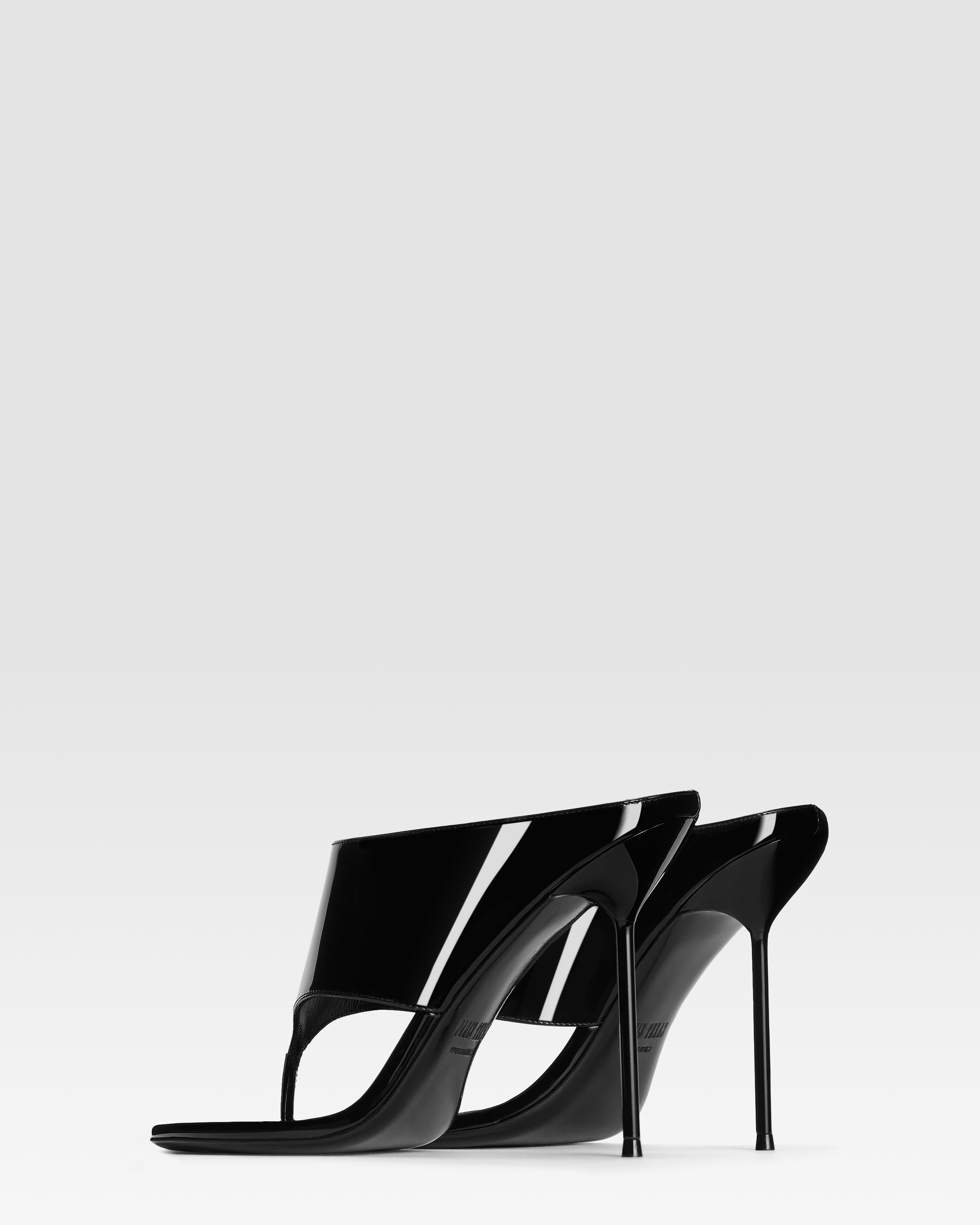 Thong mules in black patent leather
