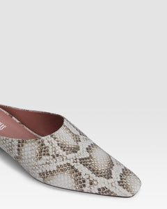 Sabots in denim-colored printed python leather