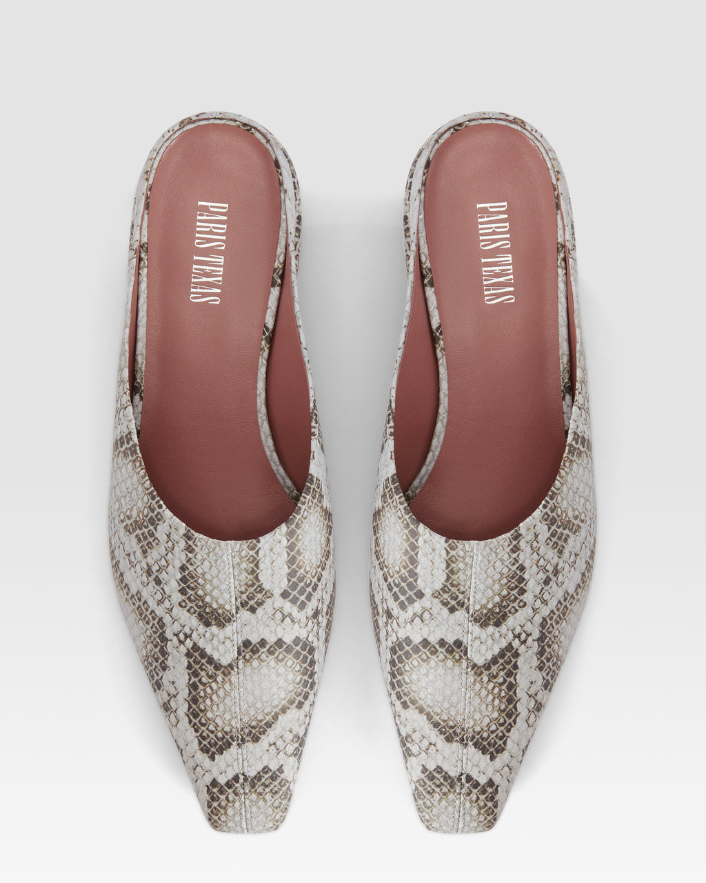 Sabots in denim-colored printed python leather