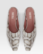 Sabots in denim-colored printed python leather