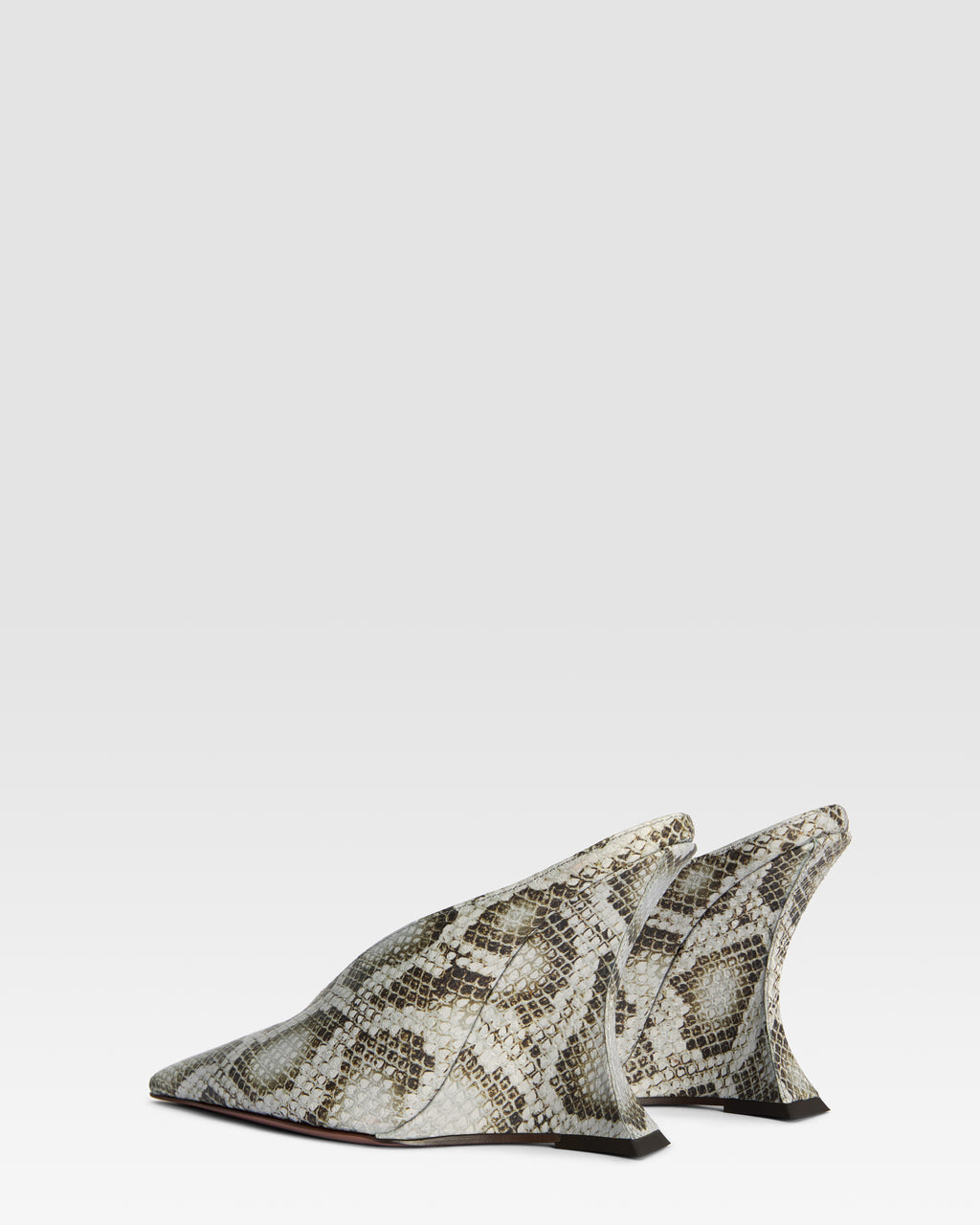 Sabots in denim-colored printed python leather