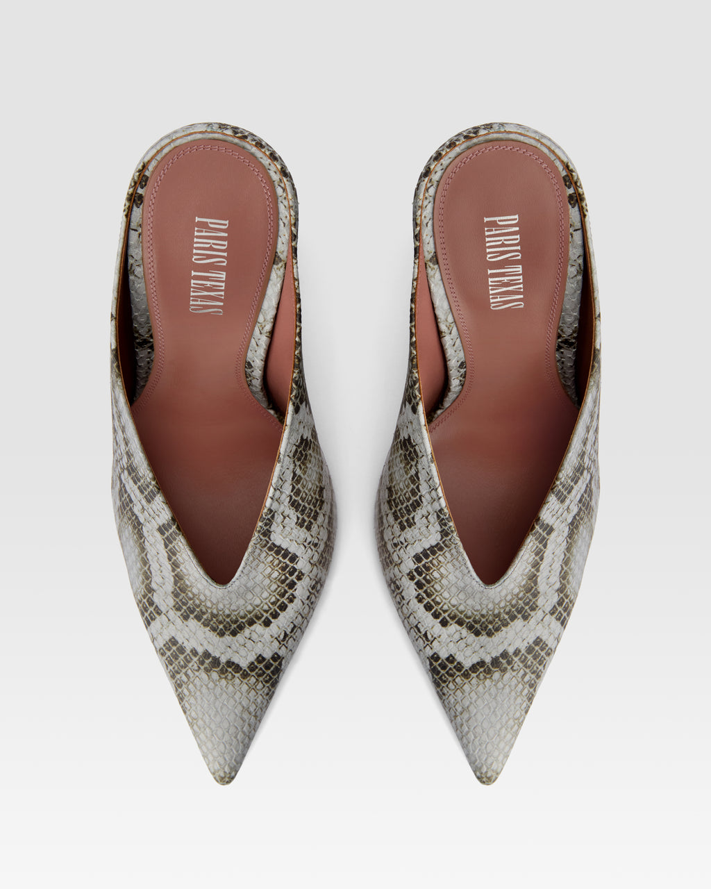 Sabots in denim-colored printed python leather