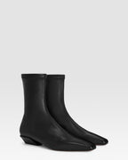 Ankle boots in black stretch leather