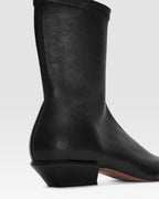 Ankle boots in black stretch leather