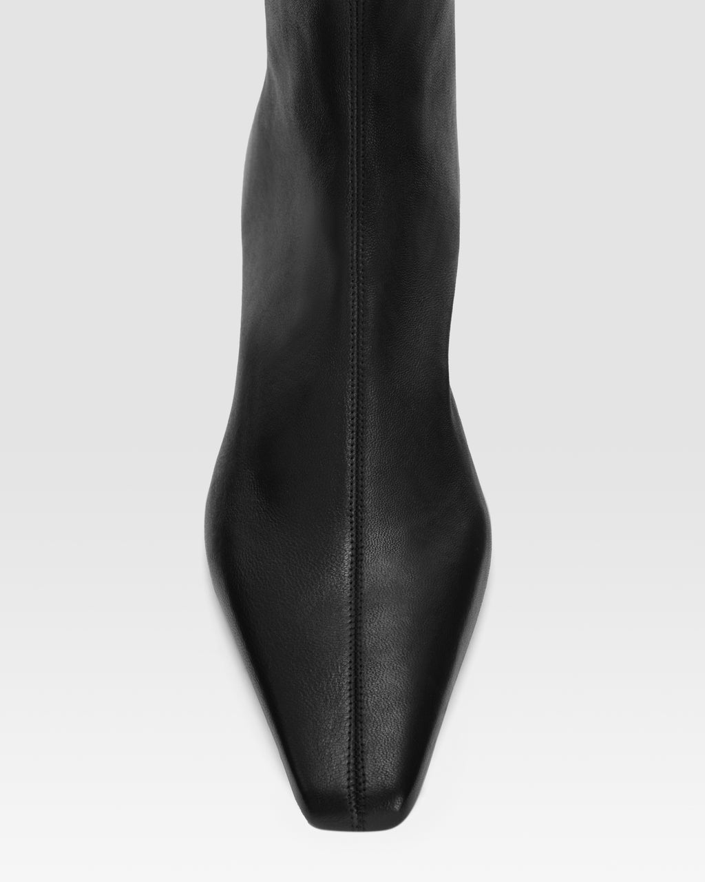 Ankle boots in black stretch leather