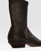 Ankle boots in ebony stretch leather