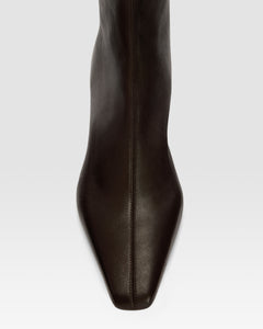 Ankle boots in ebony stretch leather