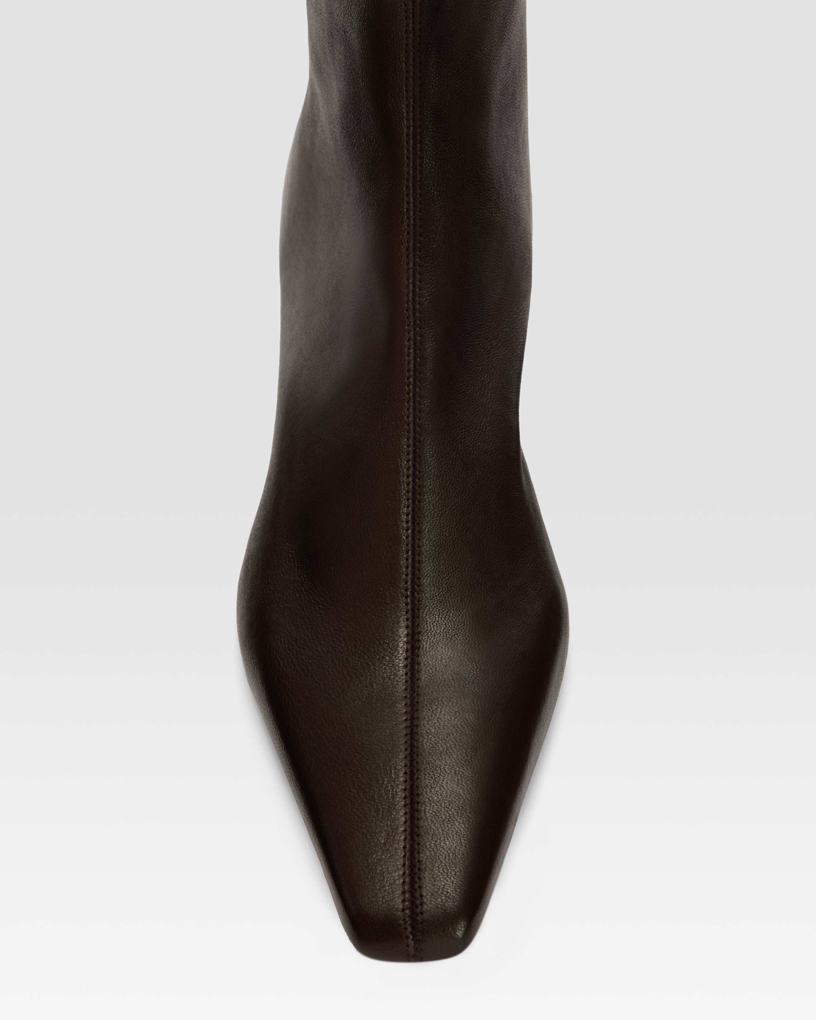 Ankle boots in ebony stretch leather