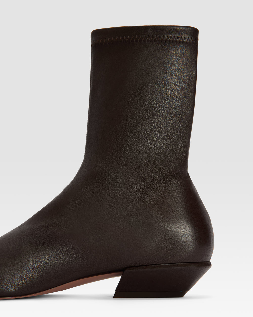 Ankle boots in ebony stretch leather