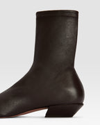 Ankle boots in ebony stretch leather