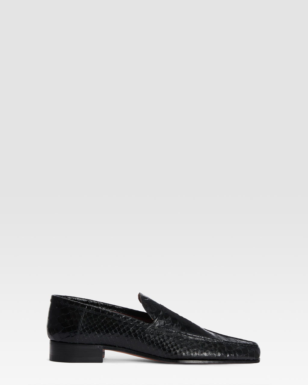 Loafers in black printed python leather