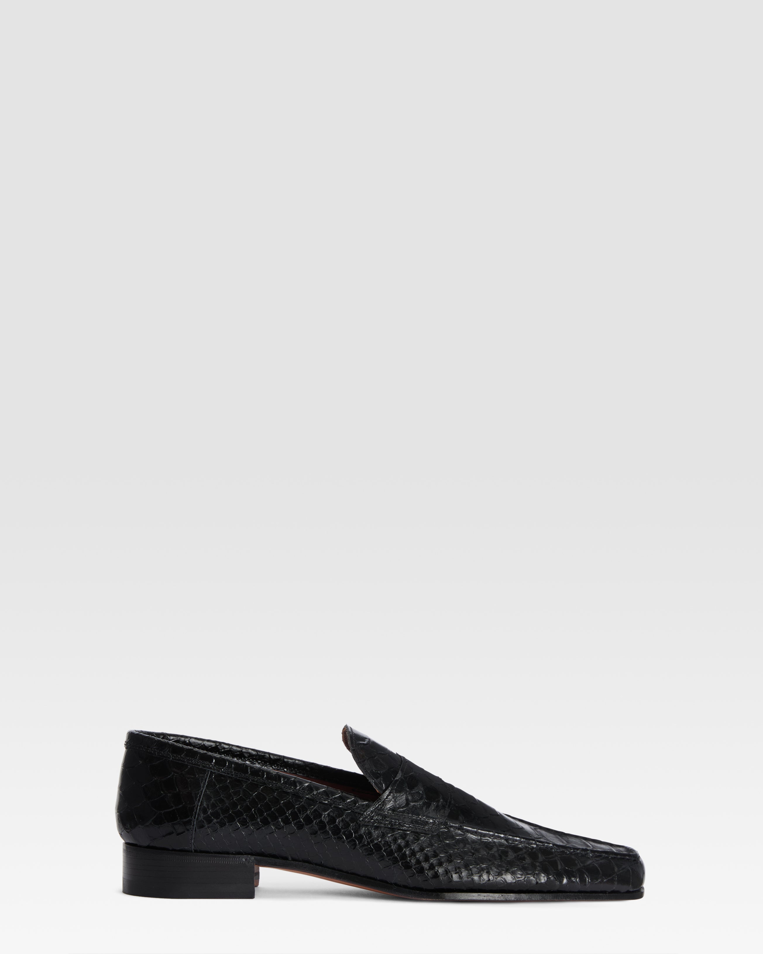 Loafers in black printed python leather