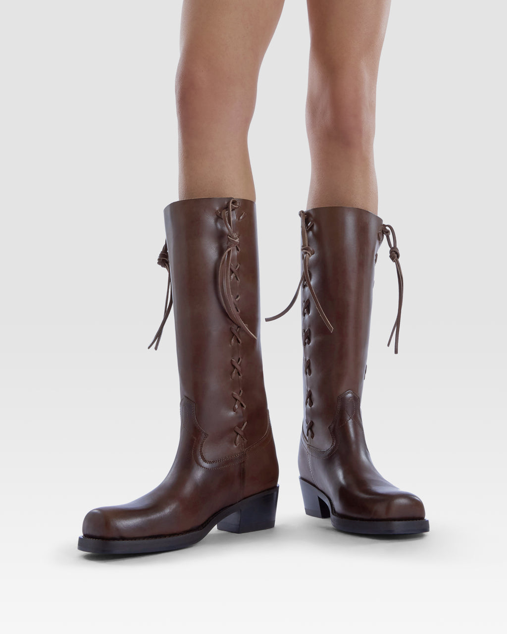 Leather boot with side braiding
