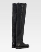 Over-the-knee boots in black calf leather.