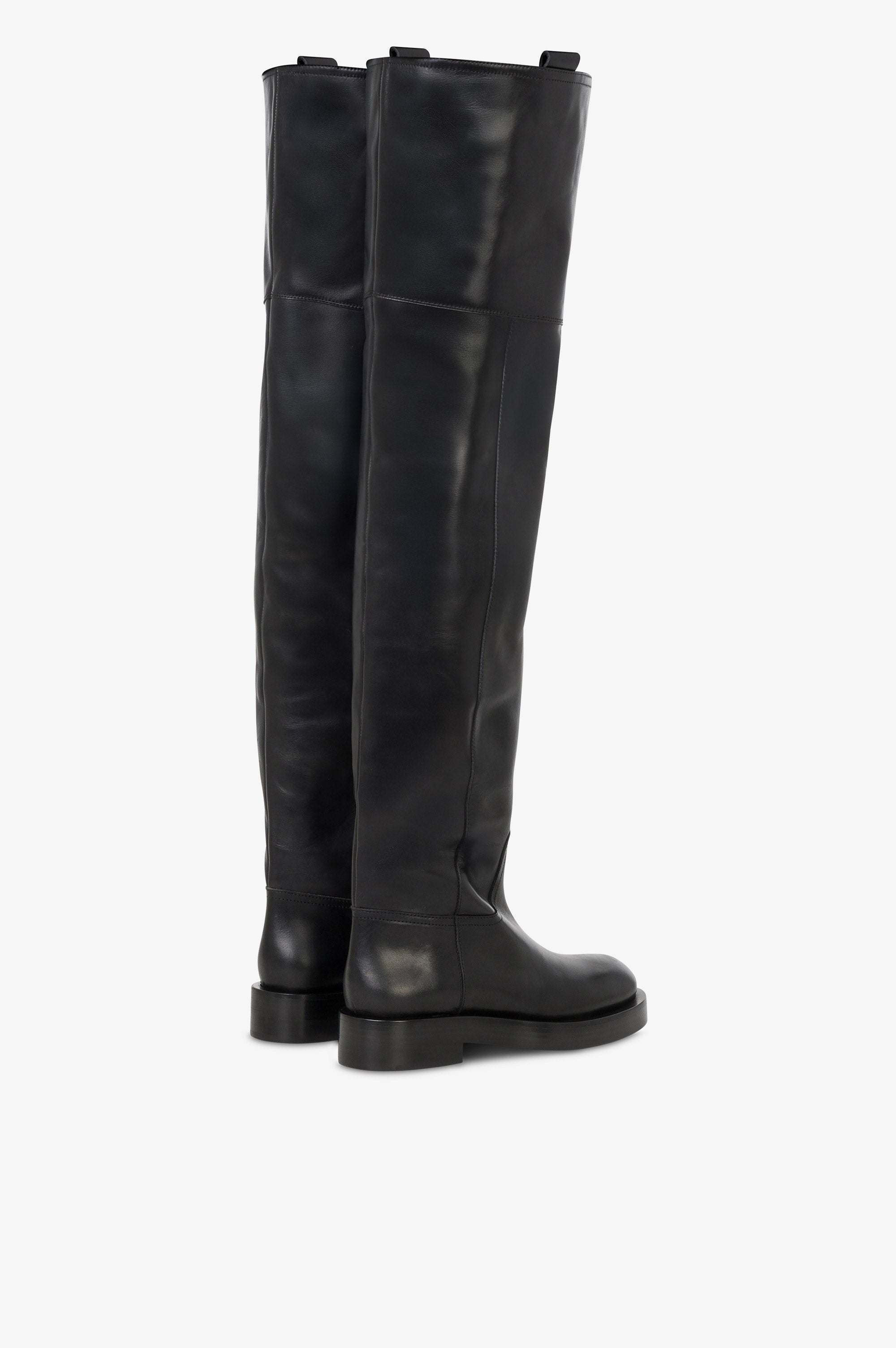 Over-the-knee boots in black calf leather.
