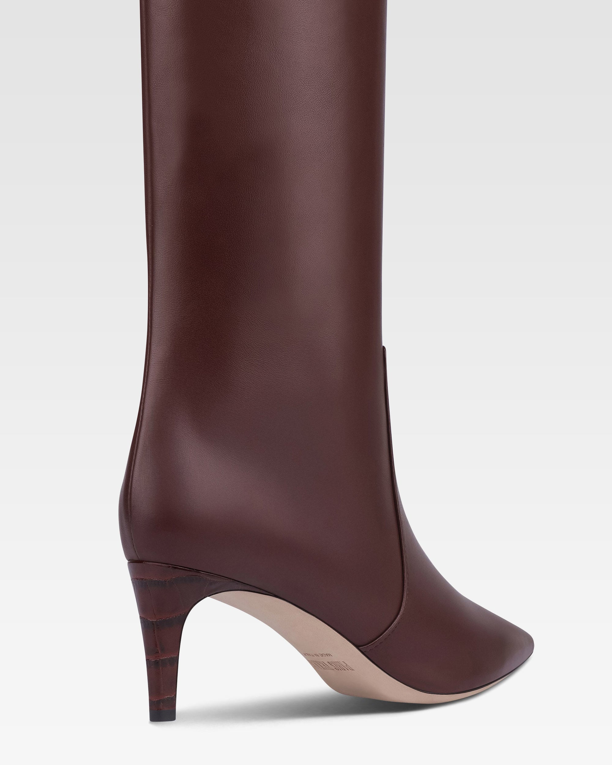 Boots in rouge noir leather