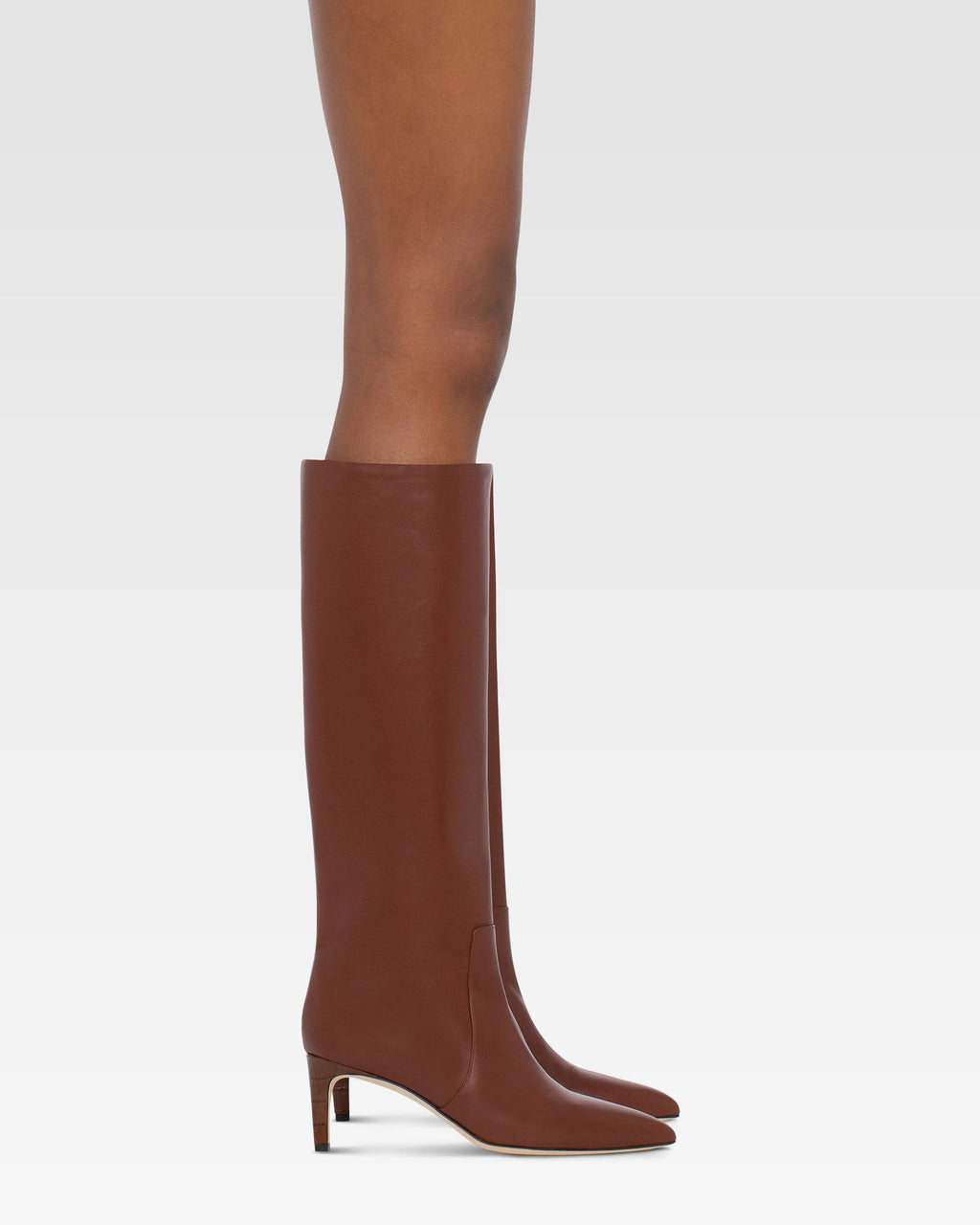 Pointed knee-high boots in smooth chocolate leather