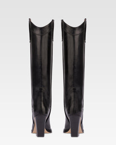 Pointed knee-high boots in black shiny vintage leather