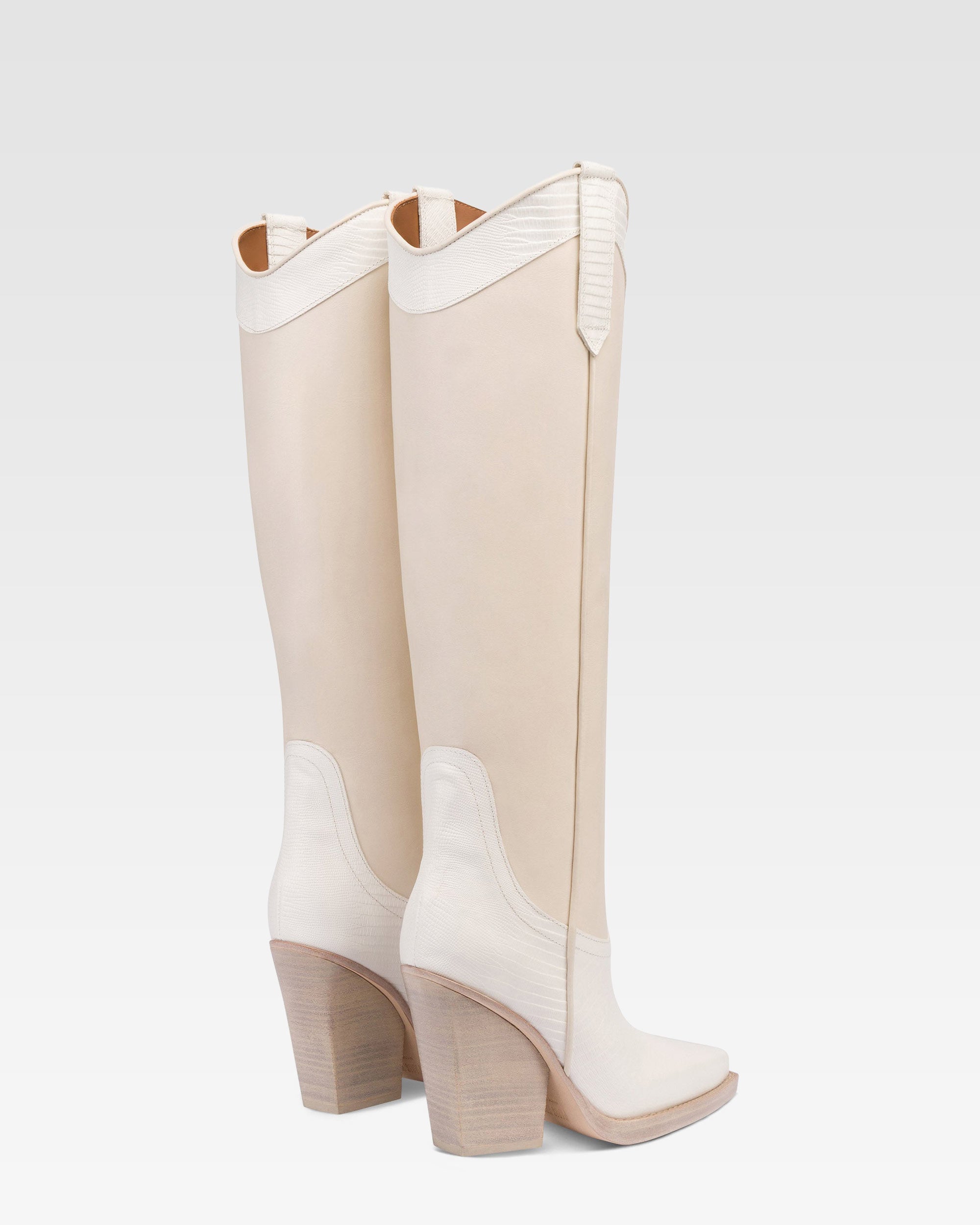 Boots in lizard-print and white leather