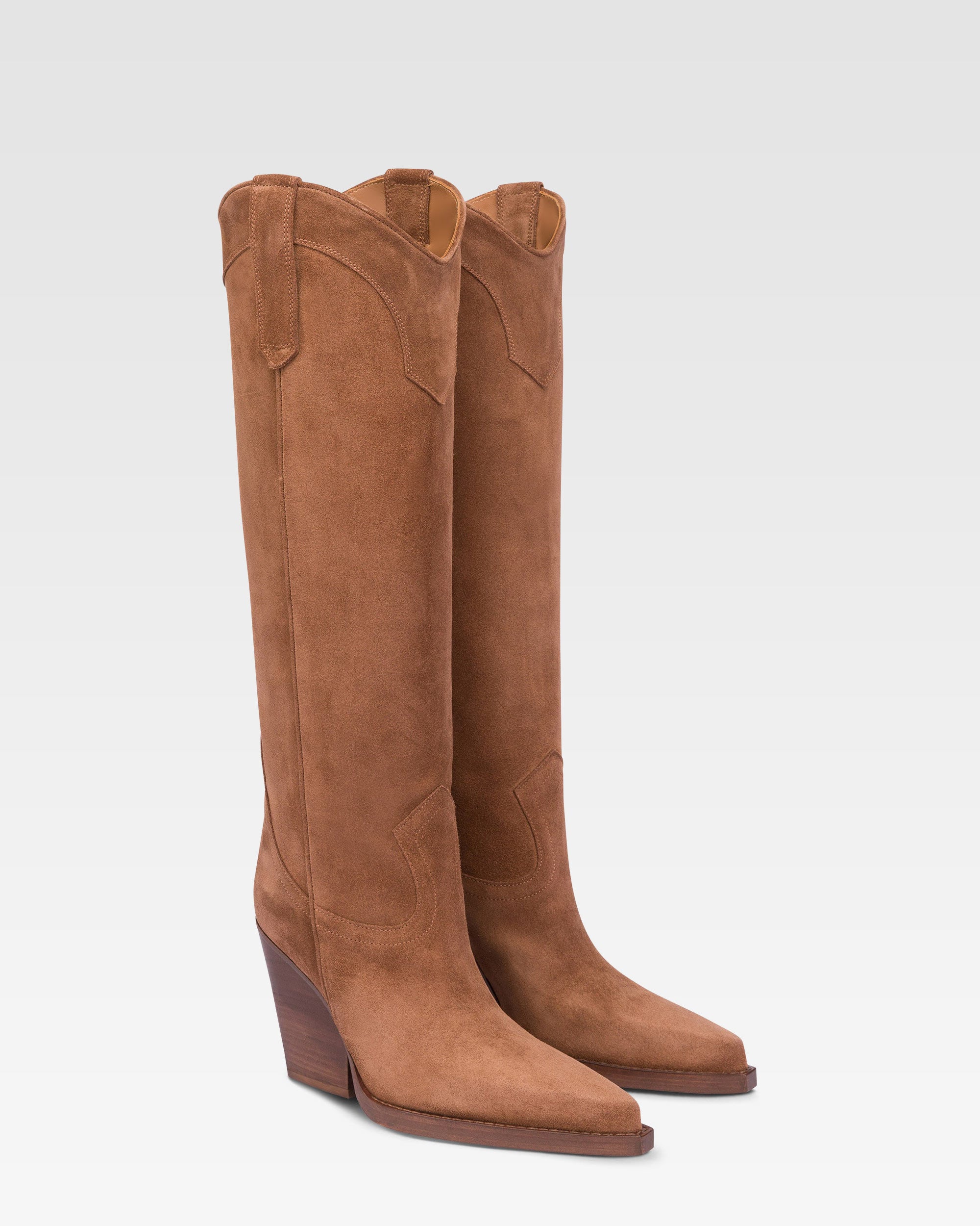 Pointed knee-high boots in smooth dark brown leather