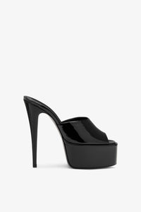 Mules `a plateau en cuir verni noir