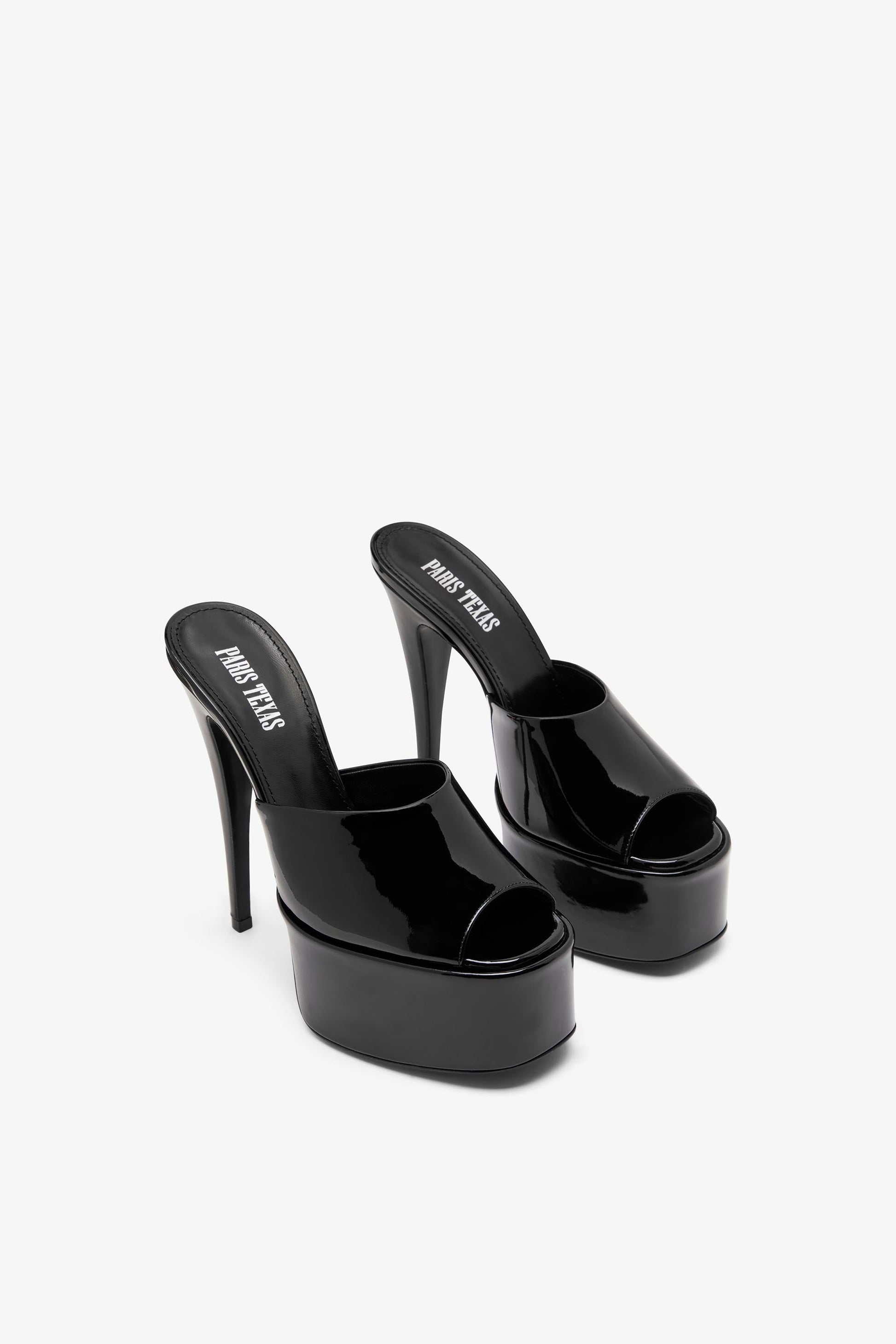 Mules `a plateau en cuir verni noir