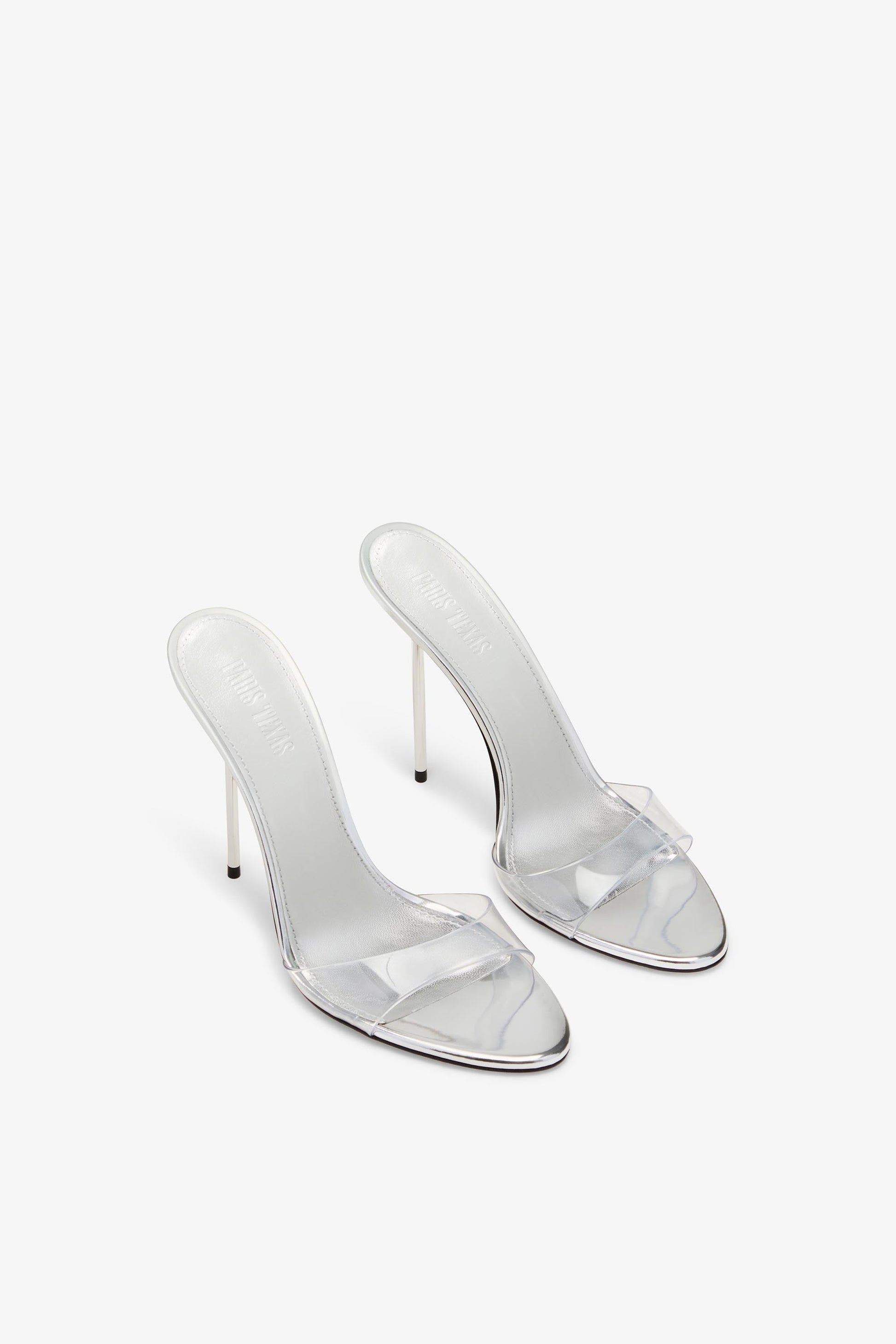 Mules en cuir et pvc argent'ees