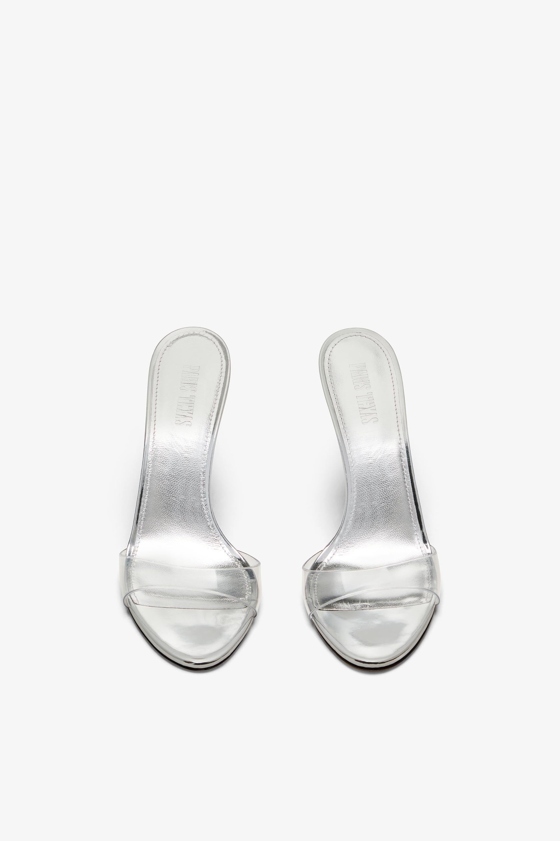 Mules en cuir et pvc argent'ees