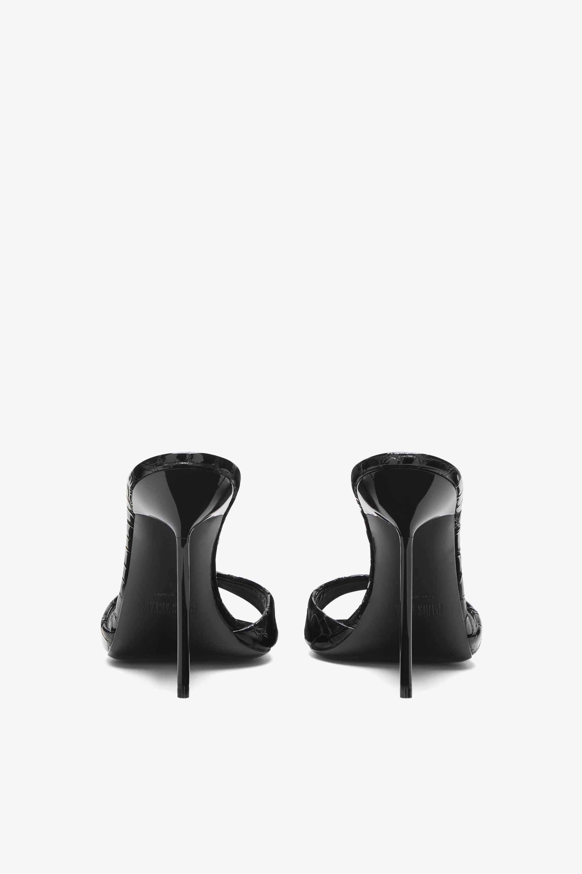 Mules en cuir emboss'e noir