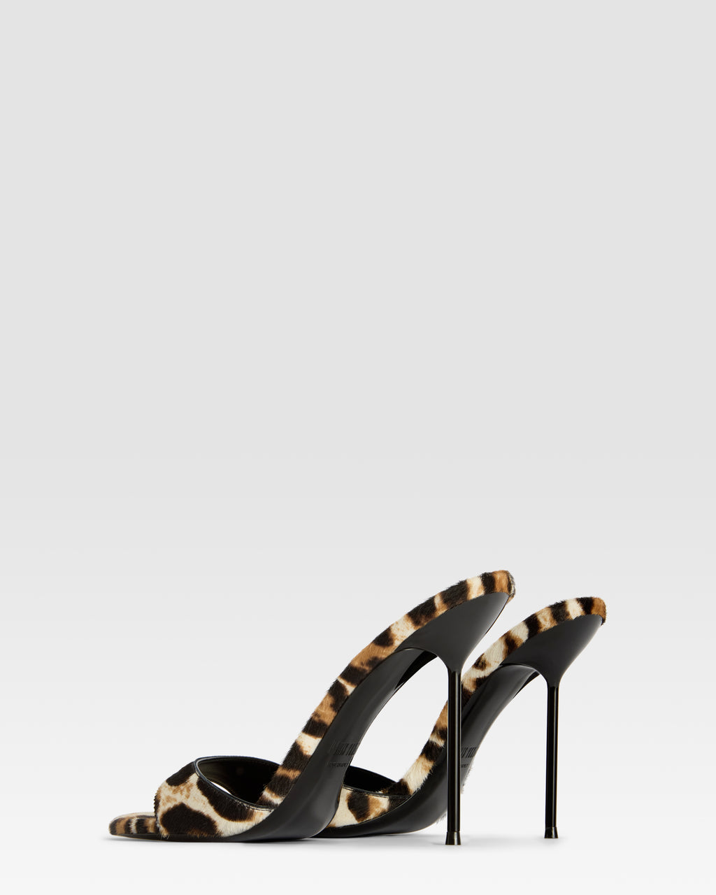 Mules in white leopard print cowhide