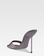 Mules in grey satin.