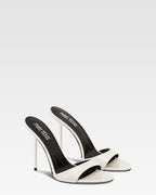 Mules in white patent leather
