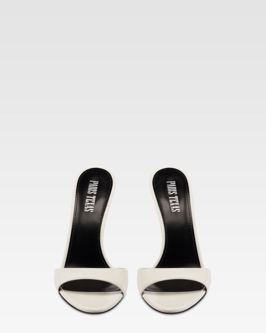 Mules in white patent leather