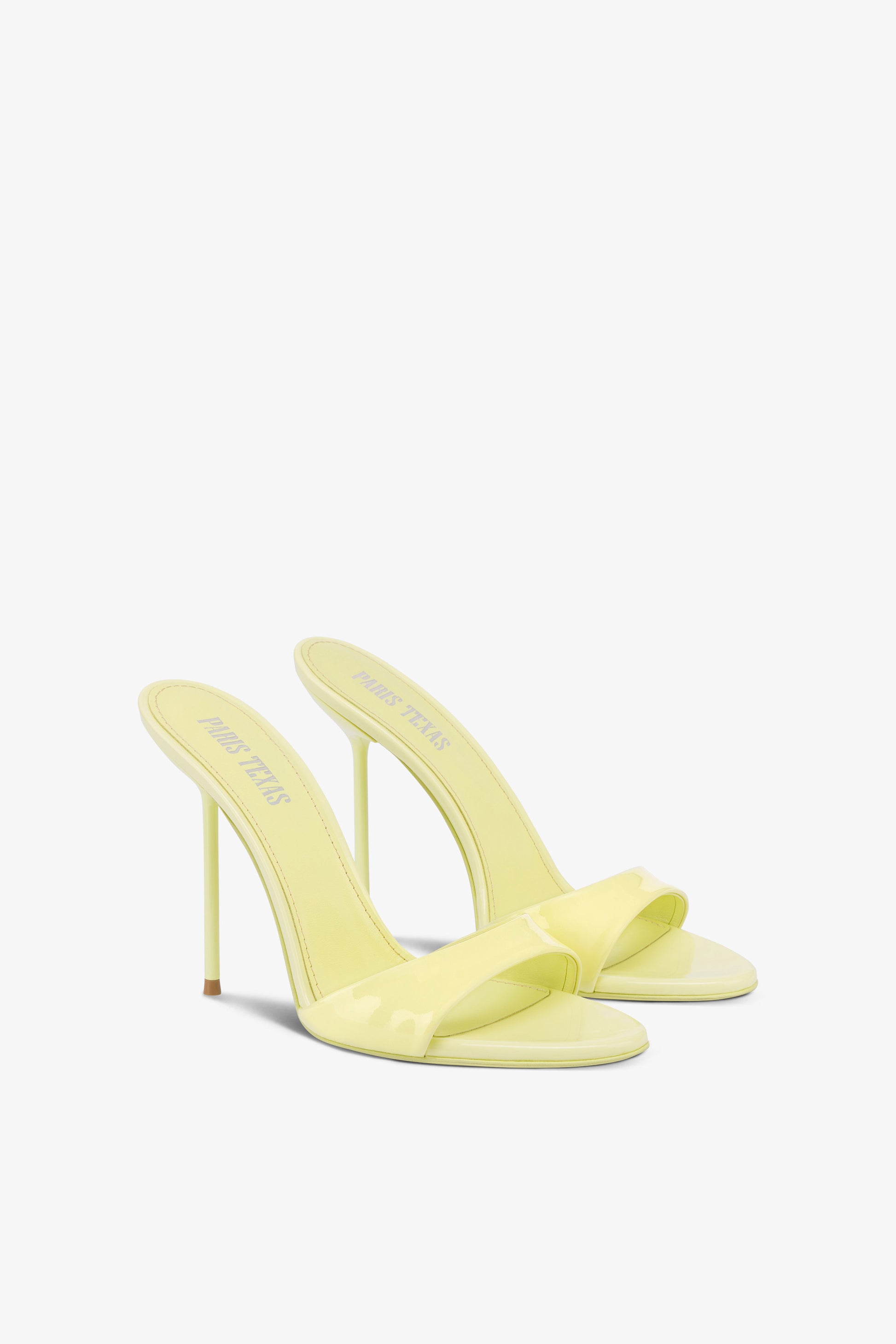 Mules in light yellow patent leather