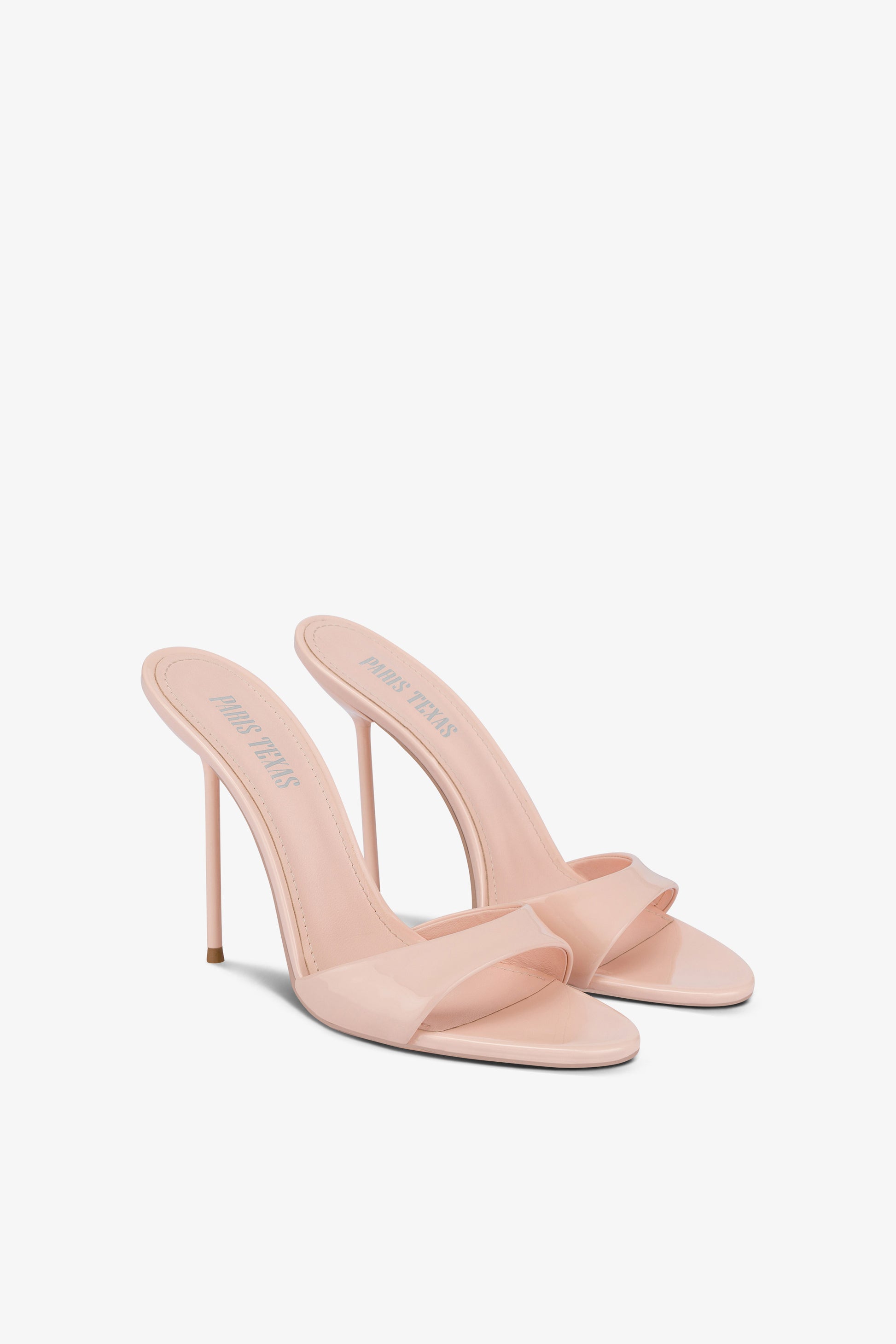 Mules in powder pink patent leather