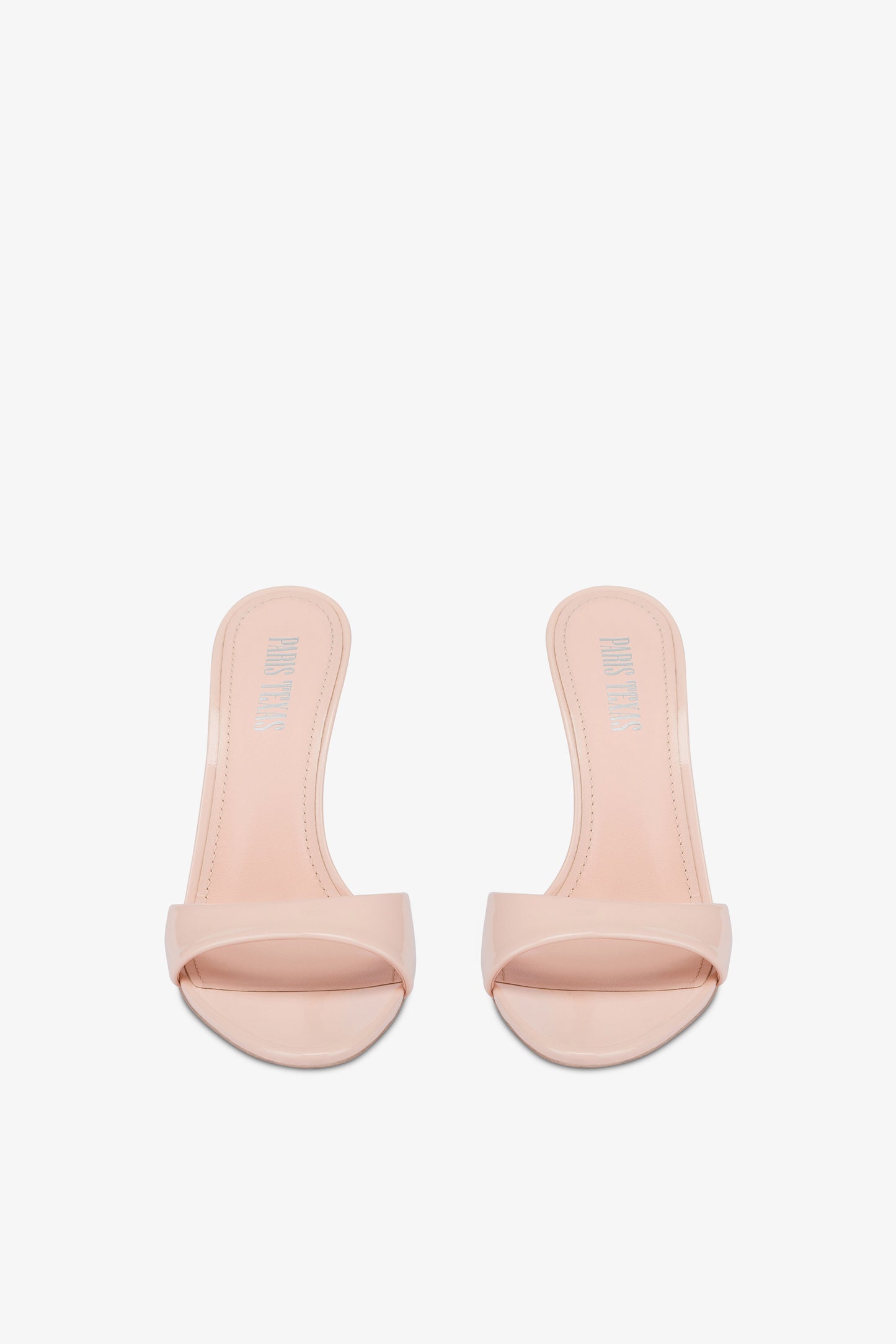 Mules in powder pink patent leather