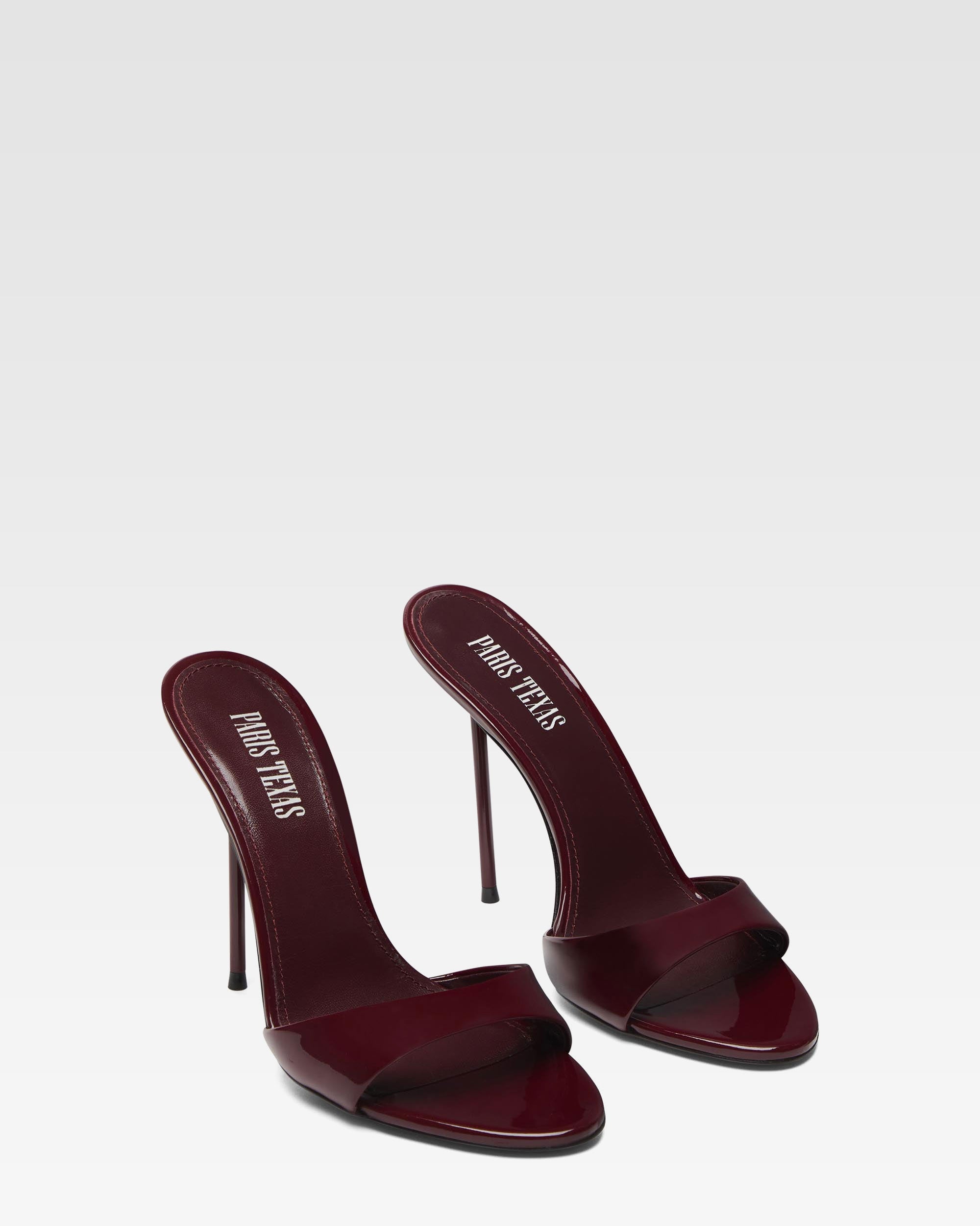 Mules in rouge noir patent