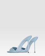 Mules in denim-colored patent leather