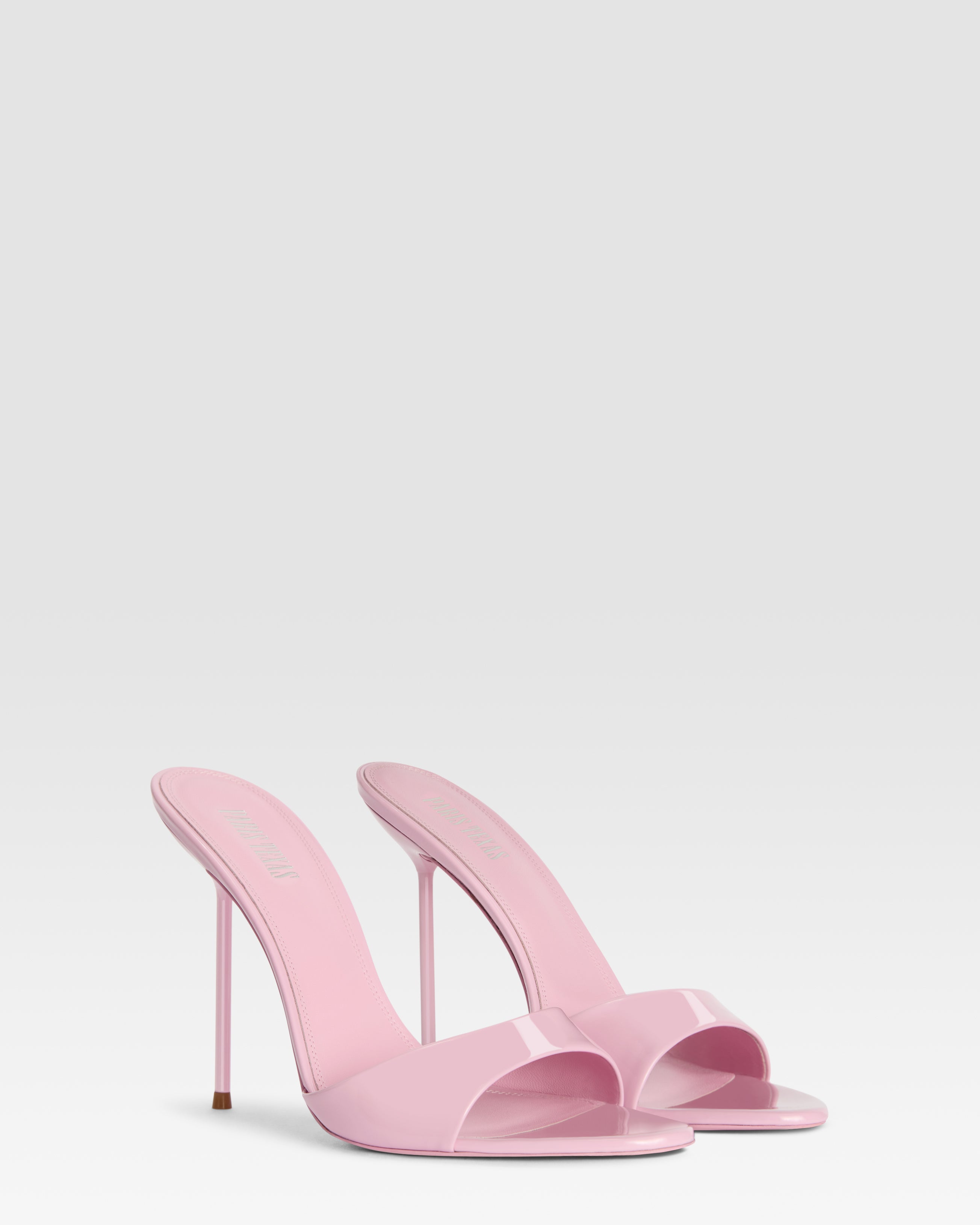 Mules in petal pink patent leather