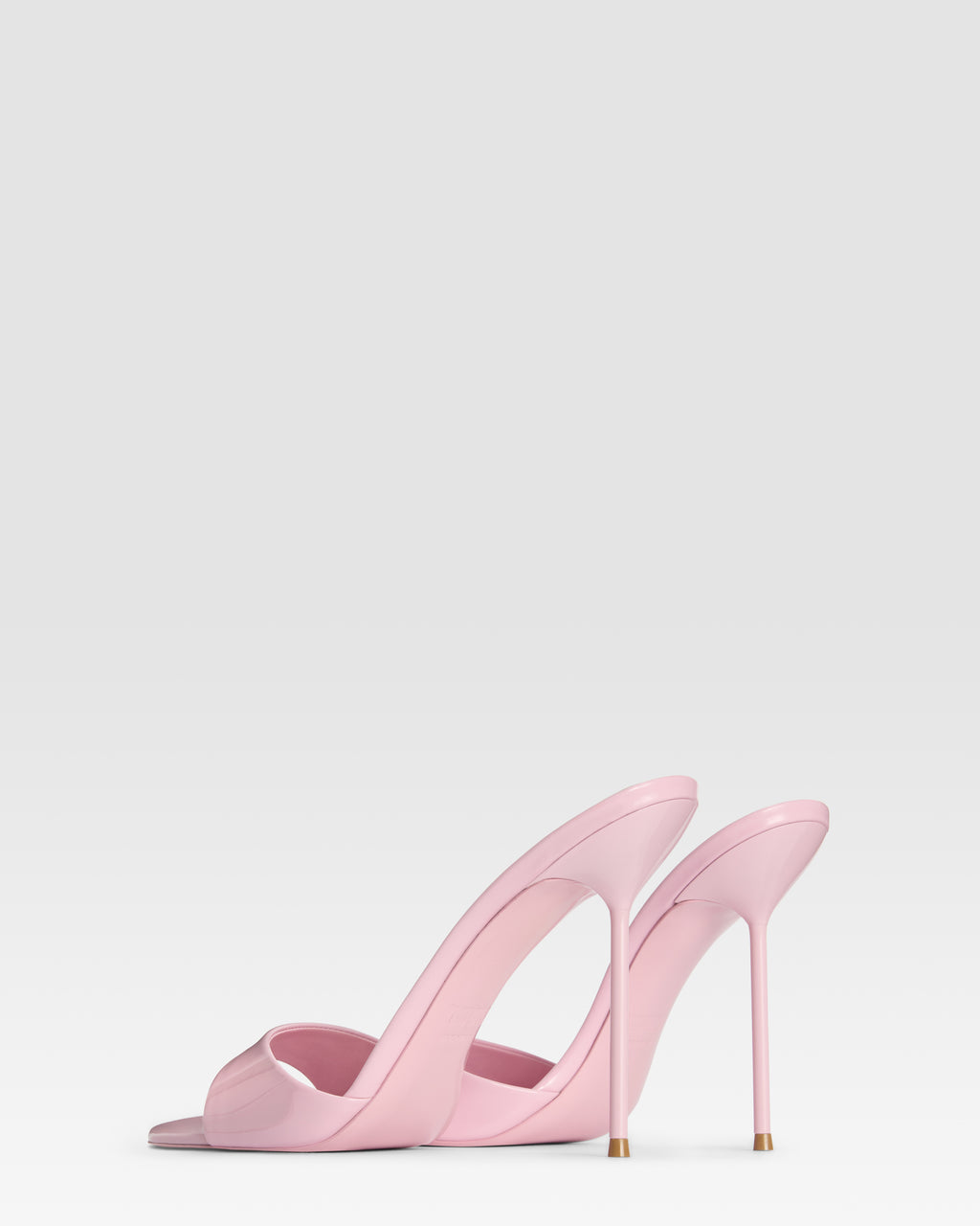 Mules in petal pink patent leather