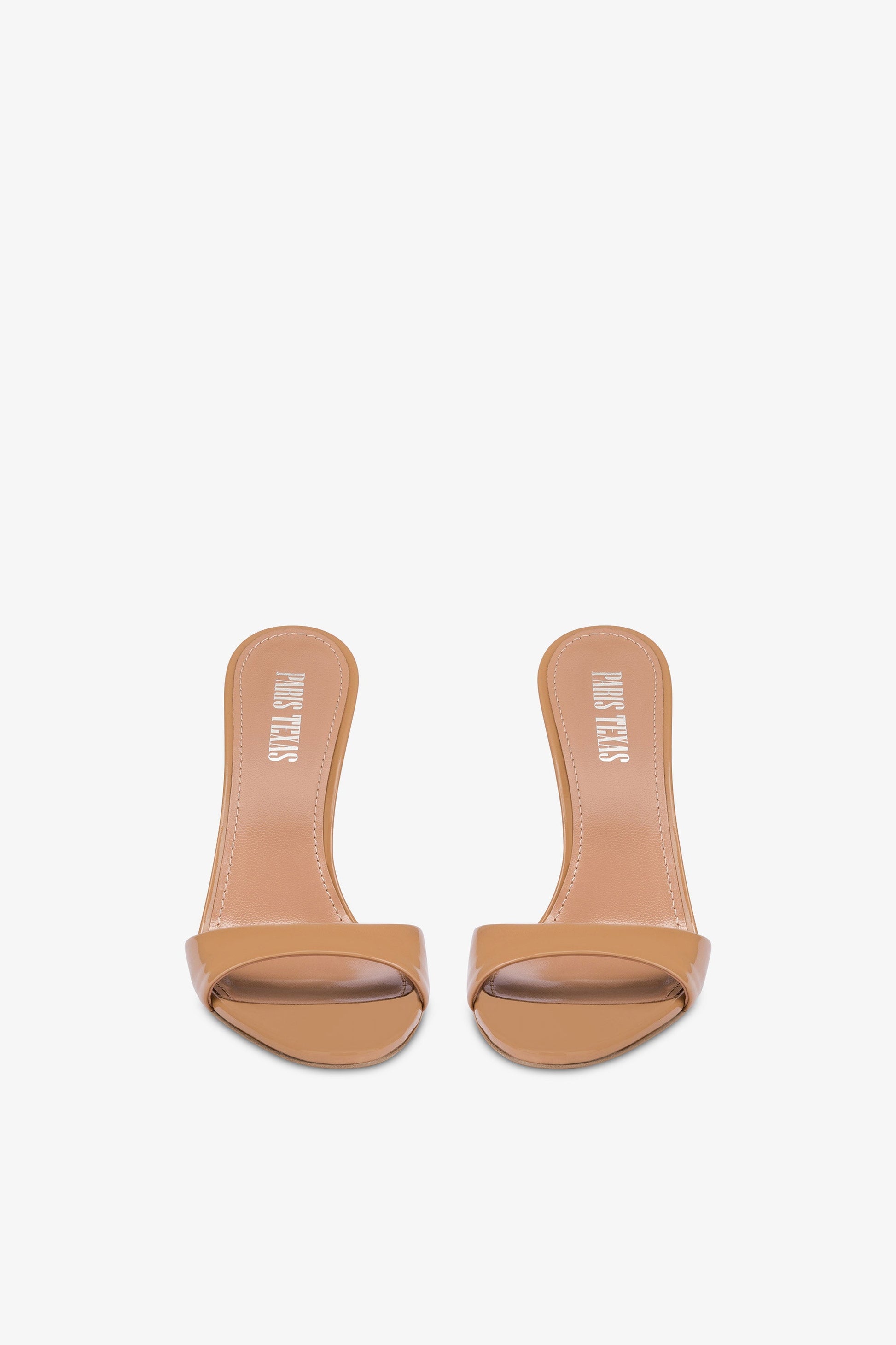 Almond-toe mules in patent caramel leather