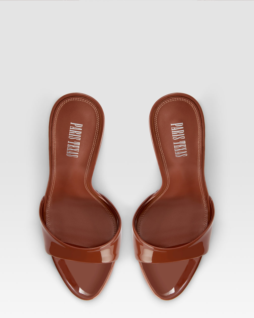 Mules in desert rose patent leather