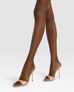 Mules in honey patent leather